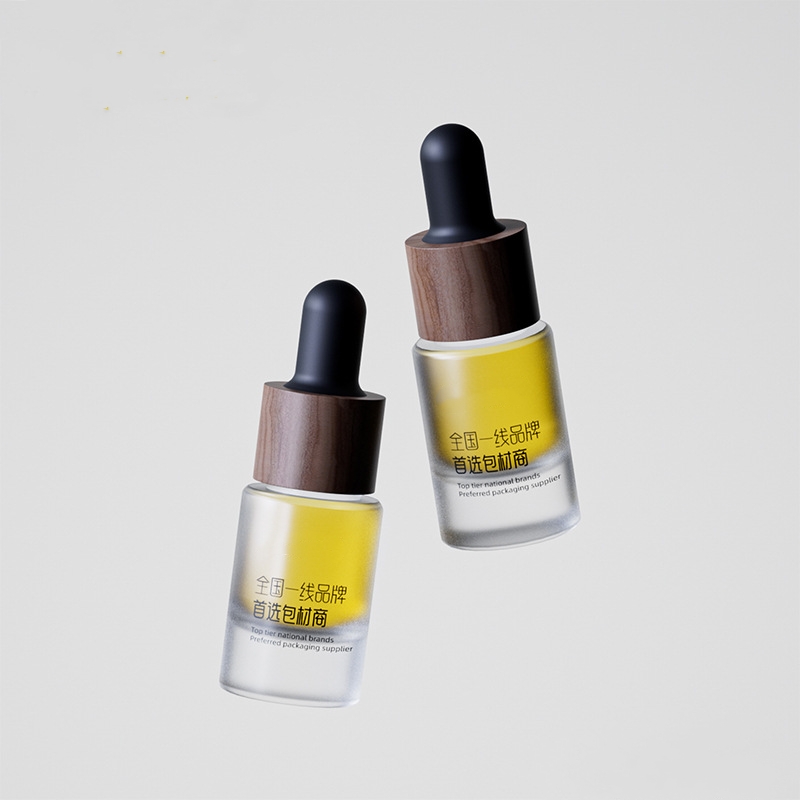 Botol minyak pati kaca kecil dengan logam atau dropper kayu Botol minyak pati kaca kecil dengan logam atau dropper kayu