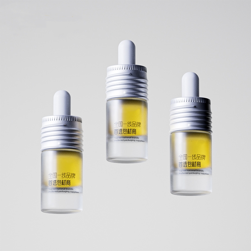 Botol minyak pati kaca kecil dengan logam atau dropper kayu Botol minyak pati kaca kecil dengan logam atau dropper kayu