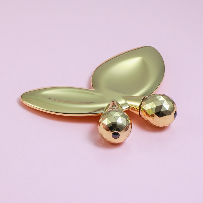 Roller urut muka rama-rama berbentuk rama-rama zink Roller urut muka rama-rama berbentuk rama-rama zink