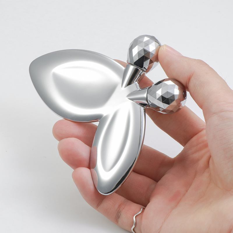 Roller urut muka rama-rama berbentuk rama-rama zink Roller urut muka rama-rama berbentuk rama-rama zink